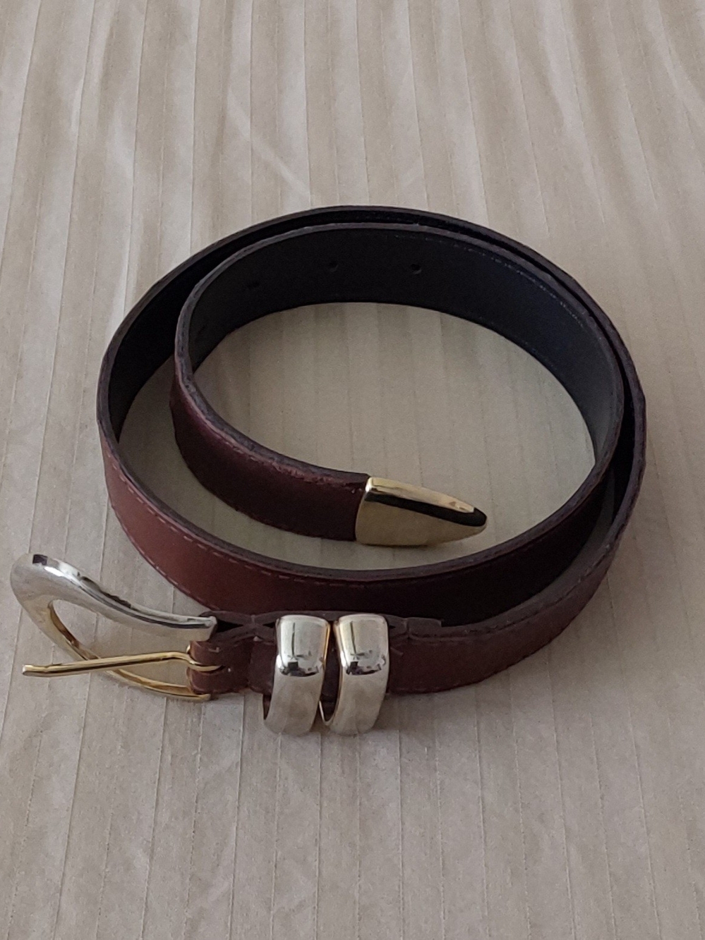 Women's Chocolate Brown Leather Belt with Gold Accents.
